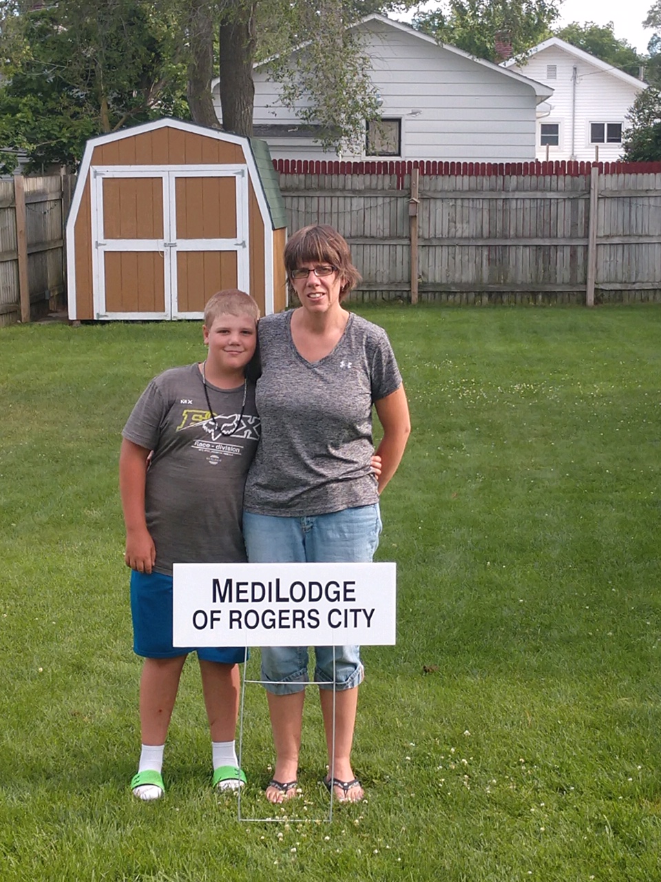 Gwen Luetzow, CNA of Medilodge of Rogers City and her son Chase at the Annual Luetzow Golf Outing